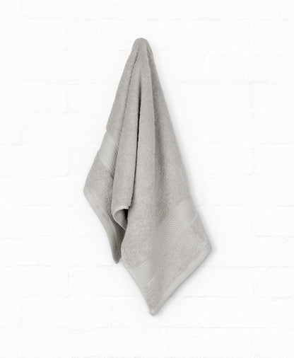 Grey luxury cotton bath towel from St. Regis 7-piece set, perfect for bathroom style and comfort.