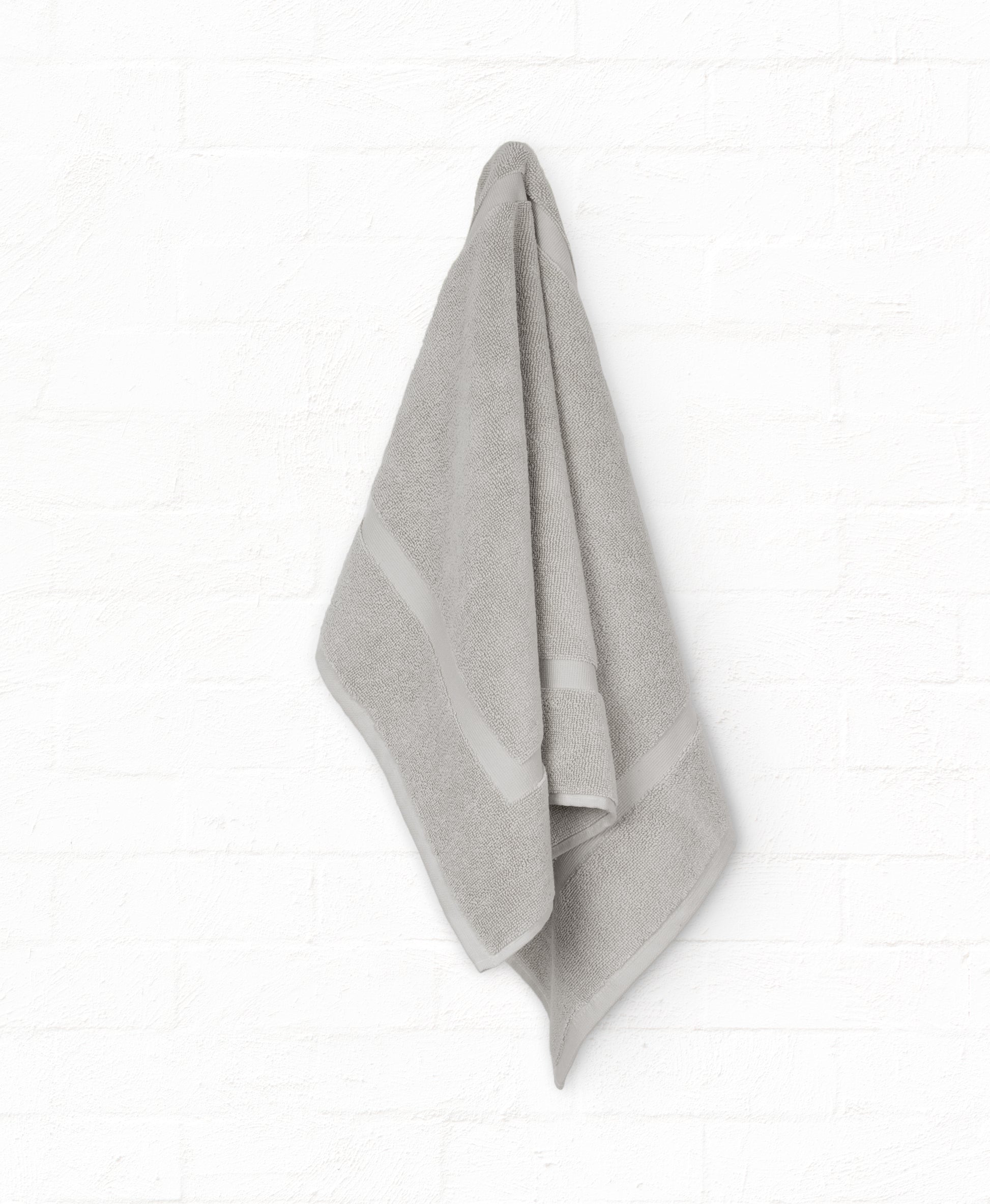 Grey 100% cotton bath towel from St. Regis 7-piece luxury collection for bathroom comfort and style.