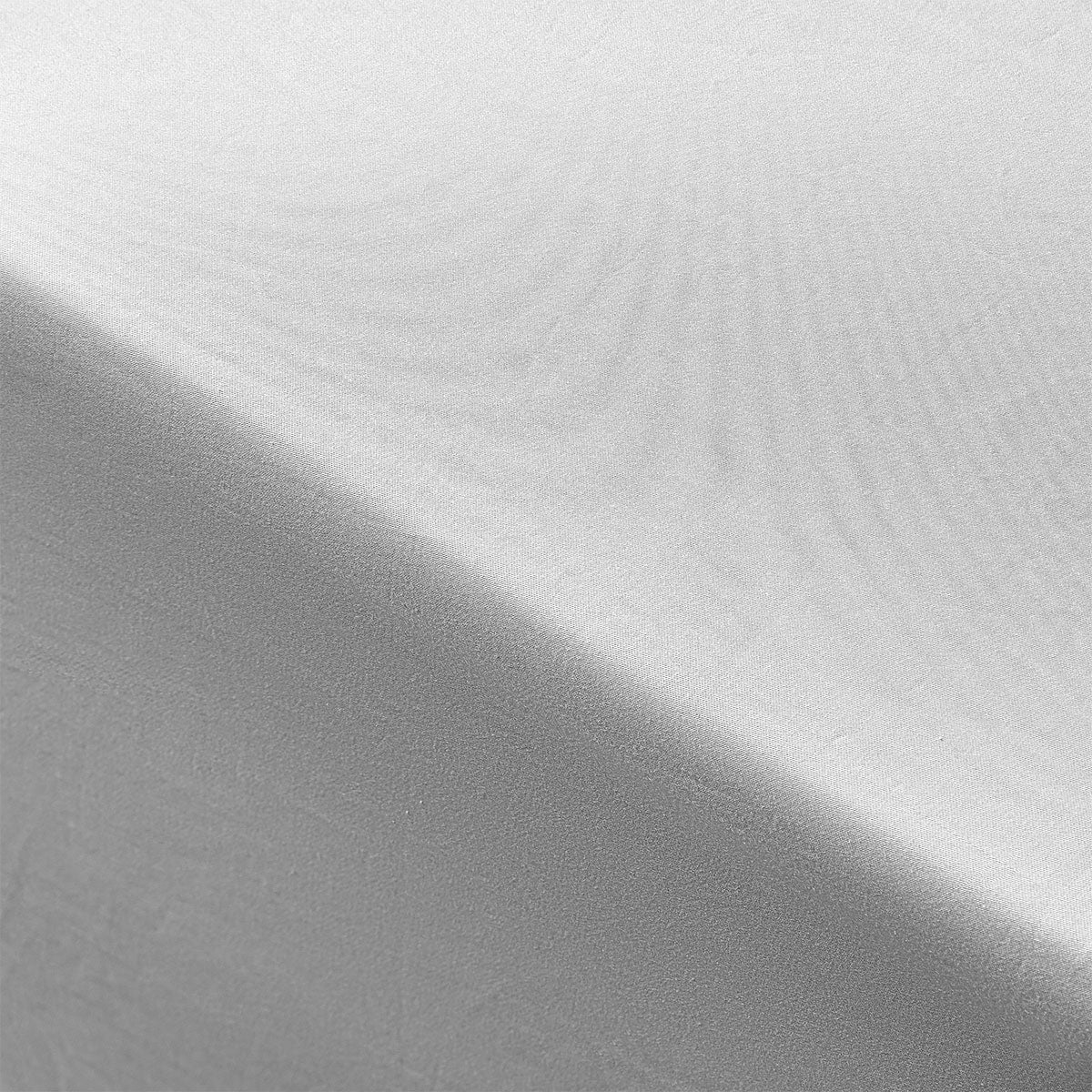 Close up view of the soft and breathable fabric of the 400TC Grey Bamboo Cotton Fitted Sheet, highlighting its premium quality as a cotton bedsheet.
