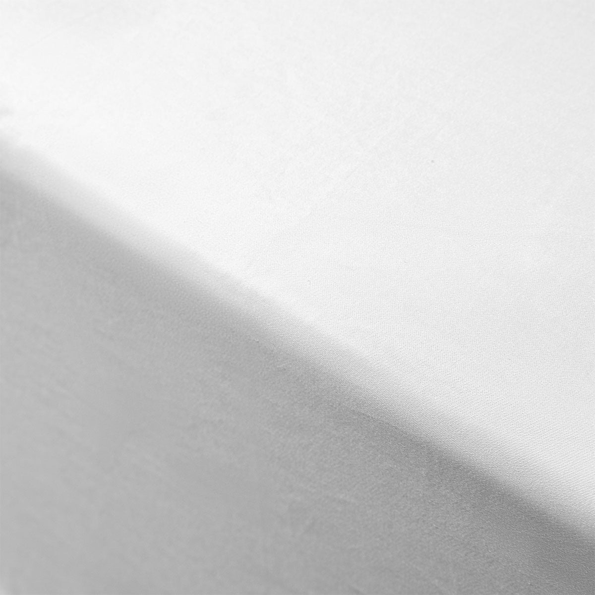 Close up view of the soft and breathable fabric of the 400TC White Bamboo Cotton Fitted Sheet, highlighting its premium quality as a cotton bedsheet.
