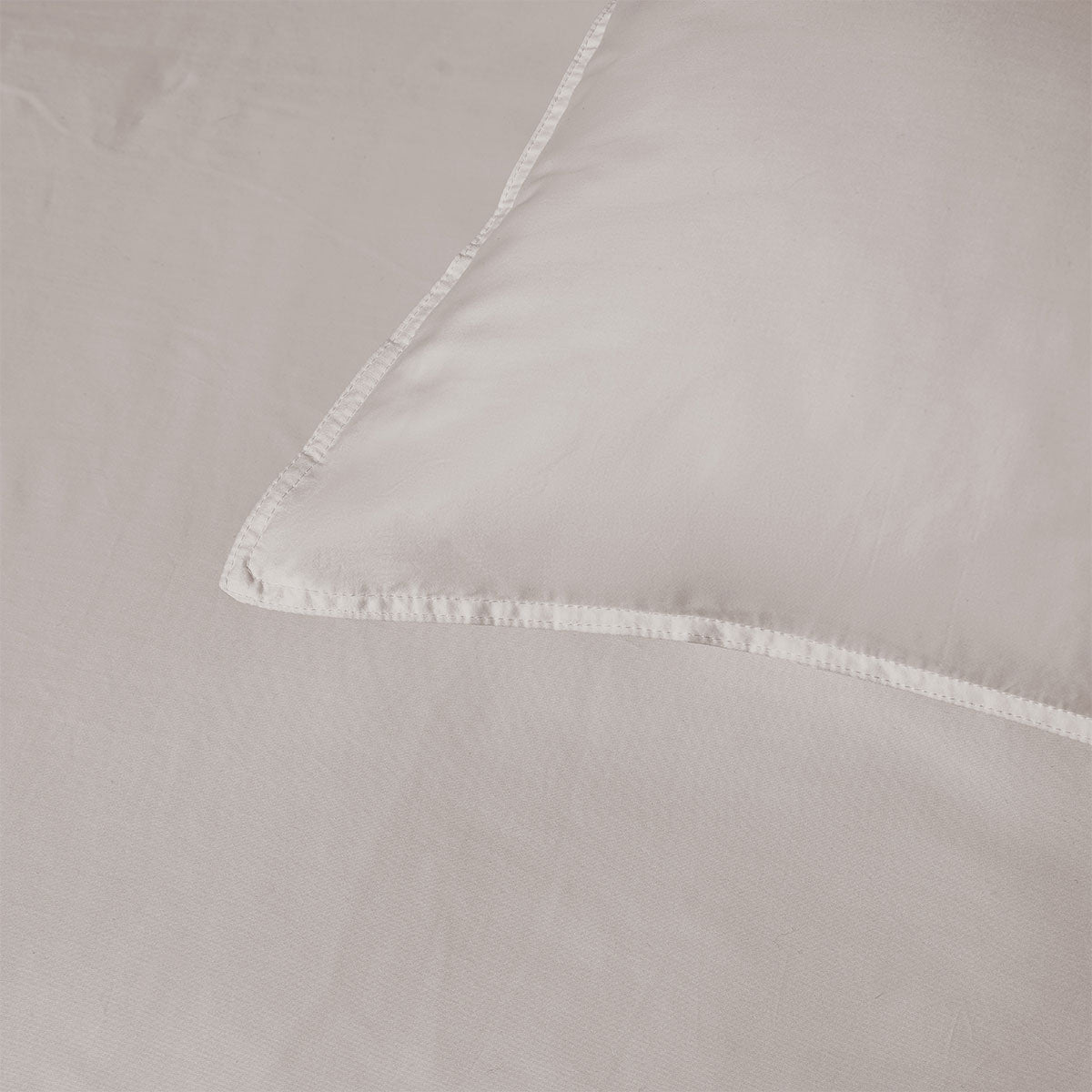 Close-up of Accessorize Stone Bamboo Cotton quilt cover set featuring elegant double stitching and a silky soft finish.