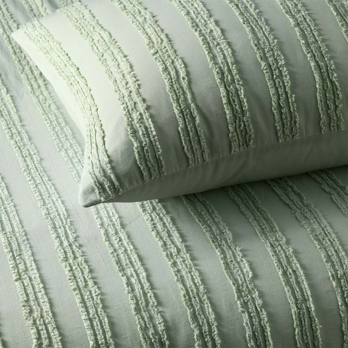 Close view of the sage vintage design quilt cover set, showing the stitching on the pillowcases and the quality finish of the cotton material.
