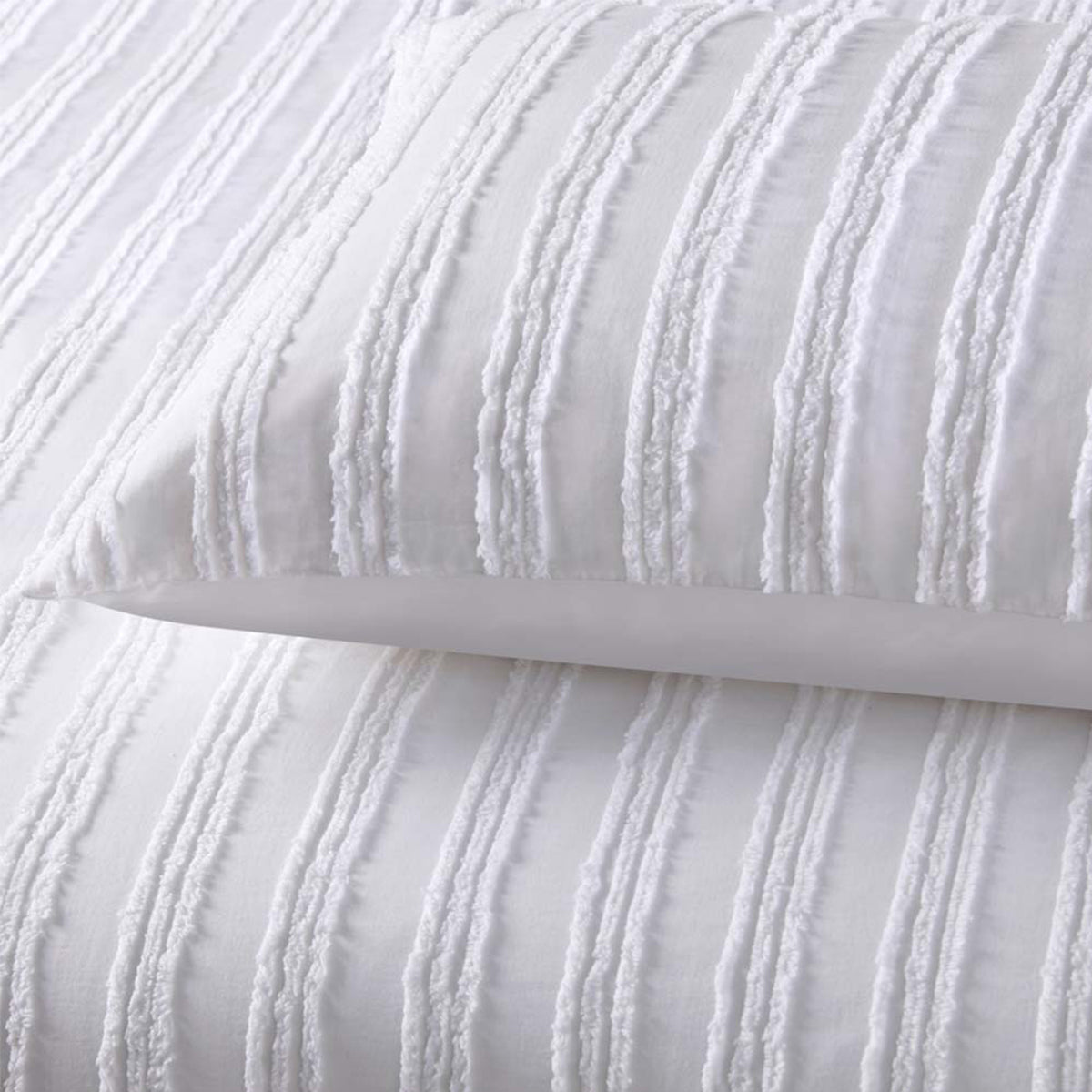 Close view of the white vintage design quilt cover set, showing the stitching on the pillowcases and the quality finish of the cotton material.
