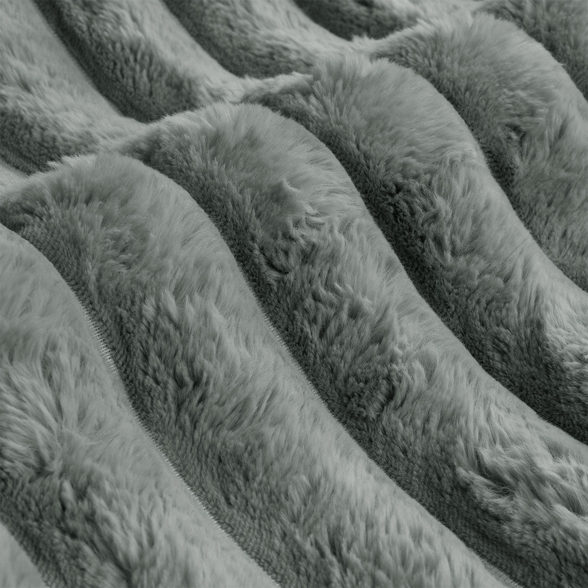 Close-up of the plush, soft texture of the Ardor Jax Grey Chunky Faux Fur Quilt Cover Set, showcasing its cozy appeal.