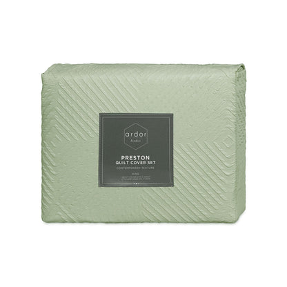 Ardor Preston Pale Green Embossed Quilt Cover Set packaging featuring tropical texture design, perfect for modern coastal decor.