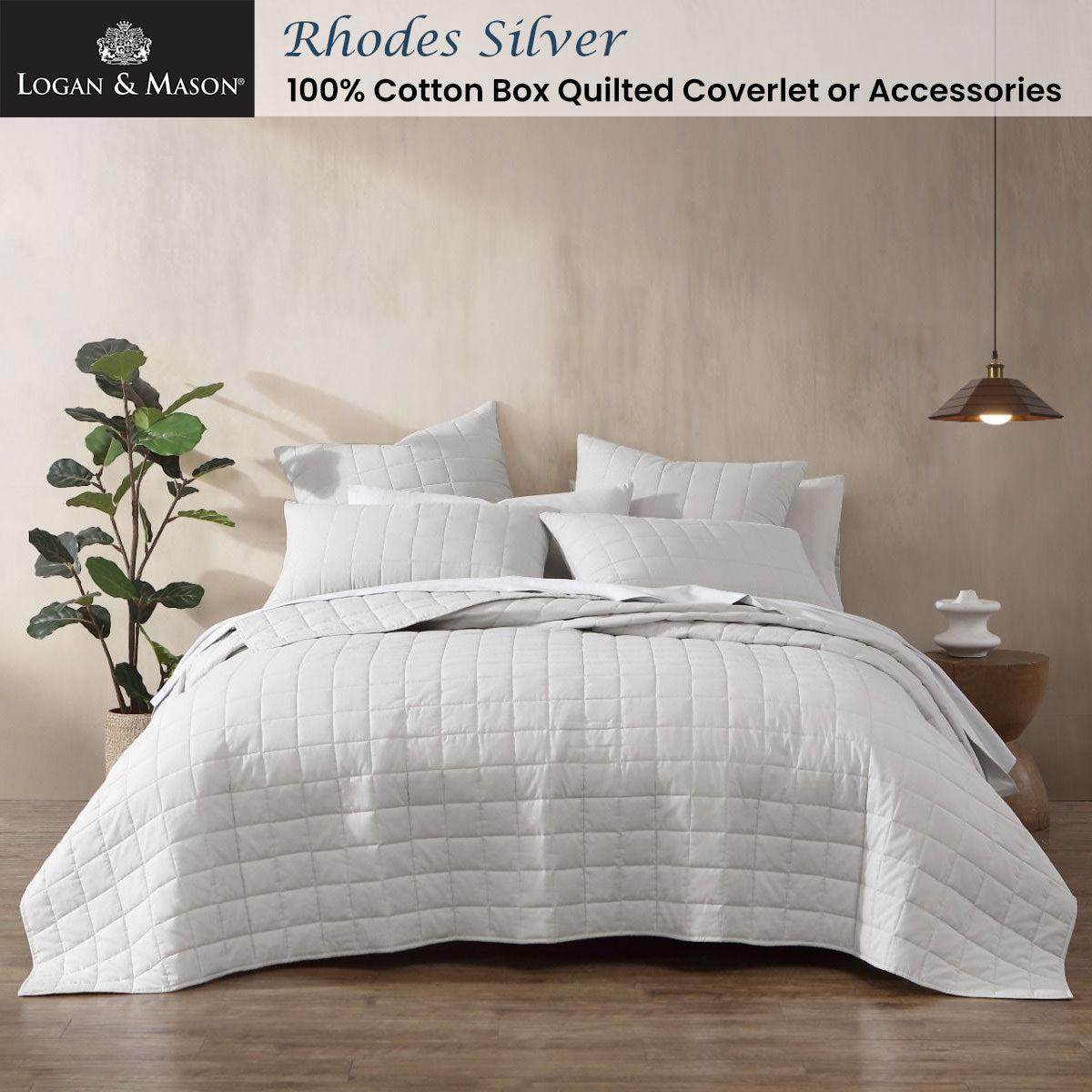 Logan and Mason Rhodes Silver 100% Cotton Box Quilted Coverlet on a bed, featuring contemporary design and soft textures.