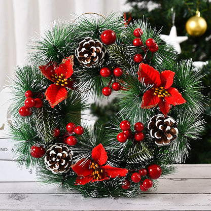 Christmas wreath door garland featuring red flowers, pinecones, and greenery, perfect for holiday decor.