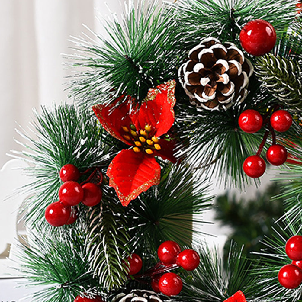 Christmas wreath garland featuring red flowers, pinecones, and vibrant greenery, perfect for festive door decorations.