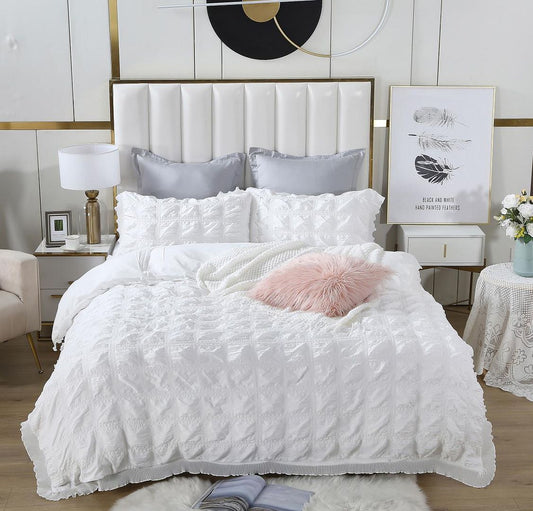 Ruffles textured jacquard queen size white duvet quilt cover set styled in a modern bedroom with elegant accessories.