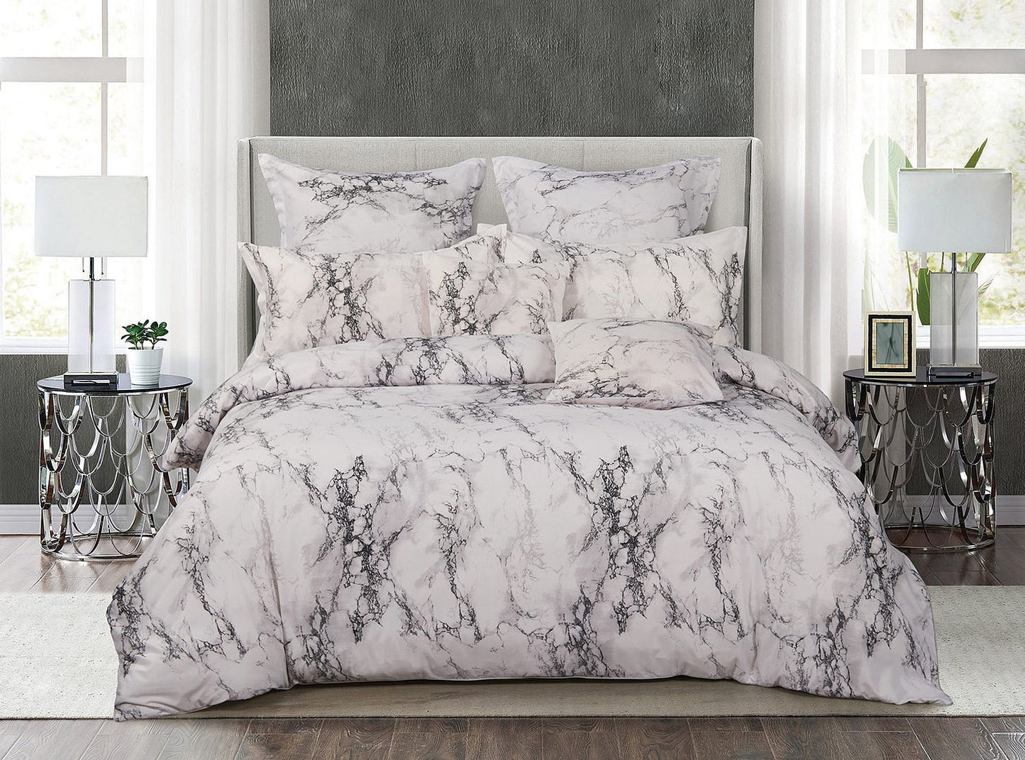 Elegant white marble duvet cover set with matching pillows, enhancing modern bedroom decor and comfort.