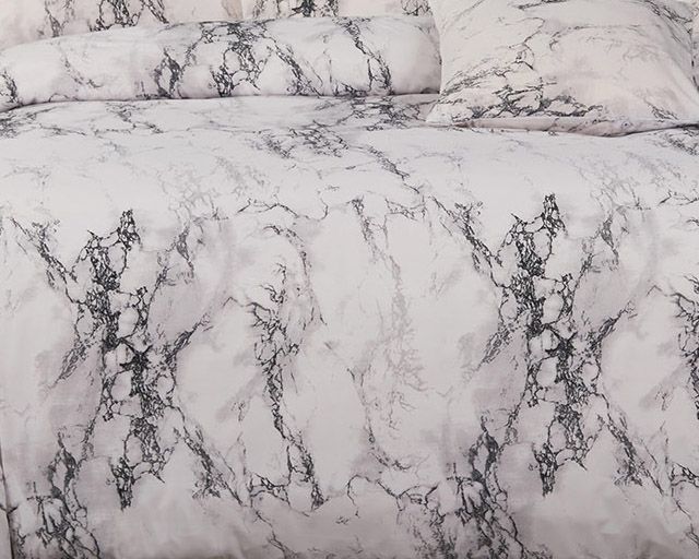 White marble pattern duvet cover set with elegant design, perfect for enhancing bedroom decor and comfort.