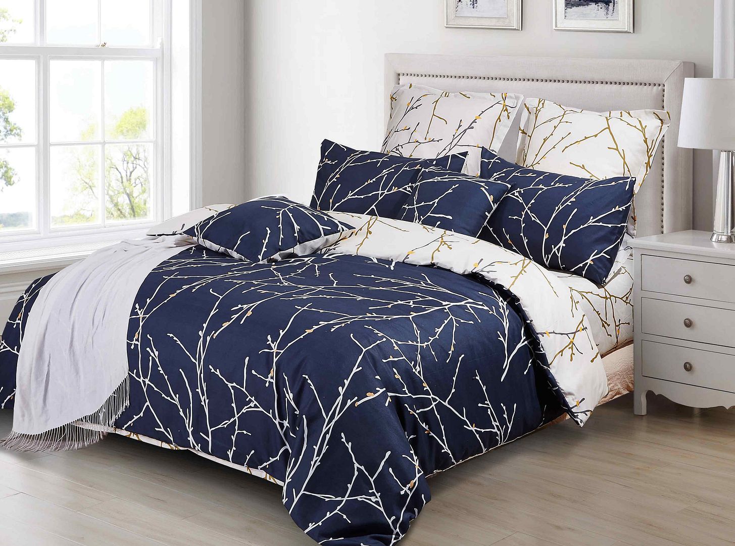 Tree reversible super king blue duvet quilt cover set, combining comfort and luxury for a stylish bedroom look.