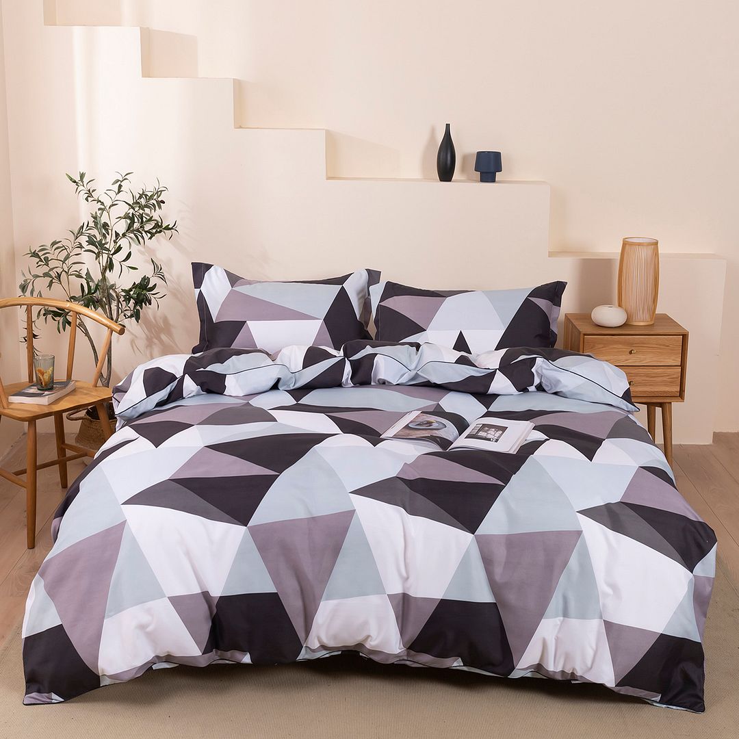 Stylish geometric quilt cover set in soft colors, perfect for enhancing bedroom decor and comfort.