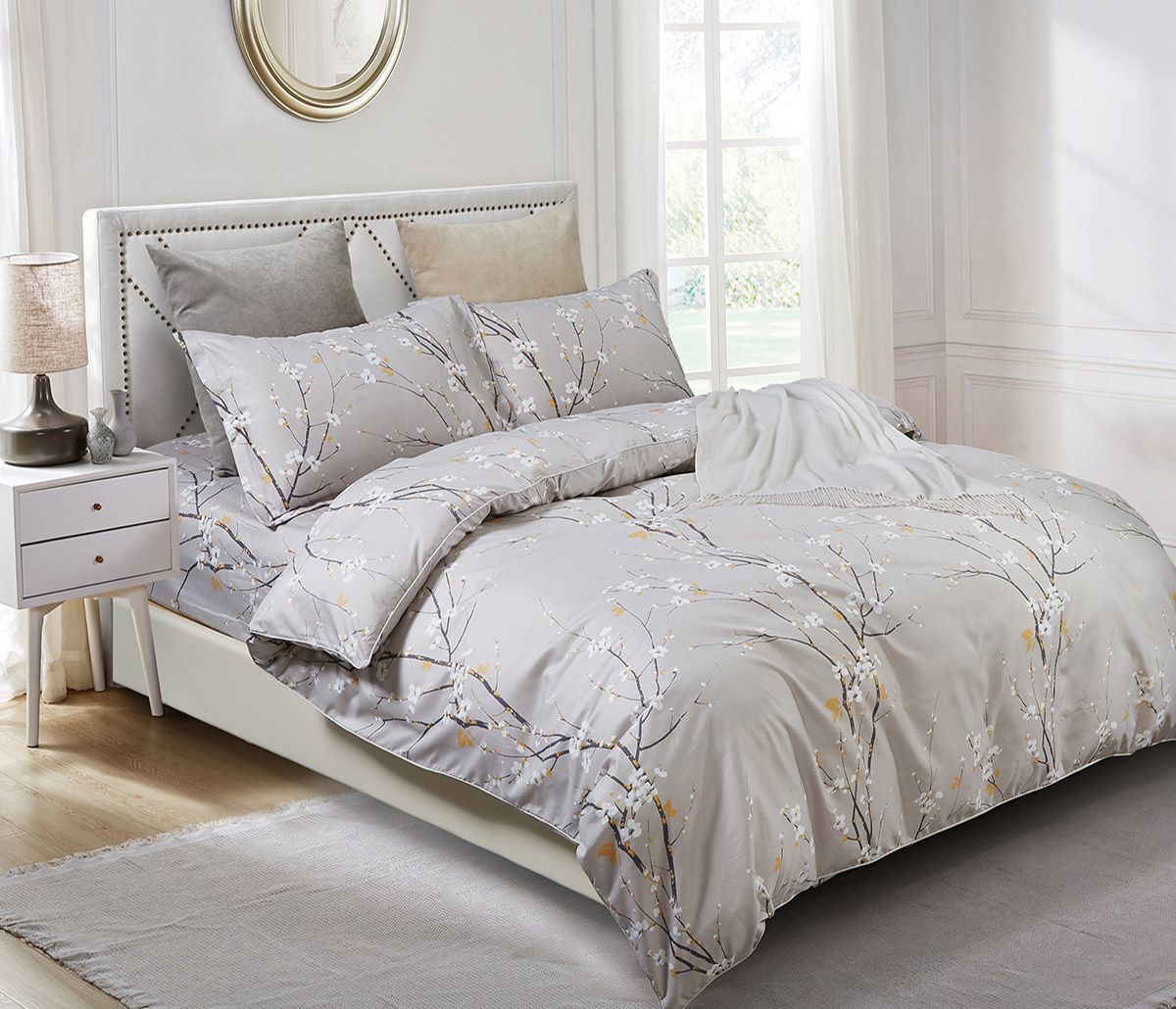 Elegant Kaito Super King Size Duvet Cover Set with floral pattern, adding style and comfort to any bedroom.