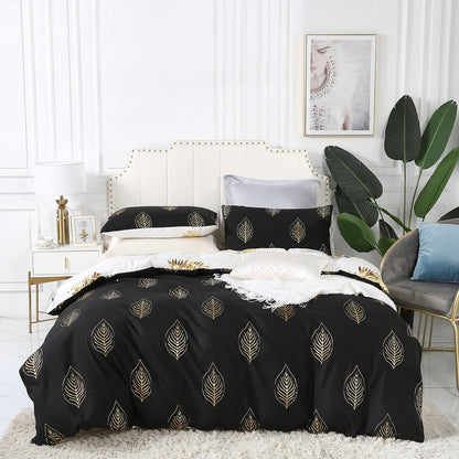 Reversible super king size quilt cover set with leaf pattern, stylishly arranged on a modern bed with elegant decor.