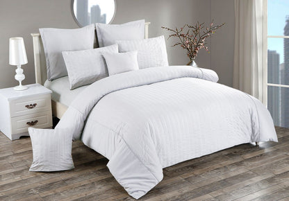 Seersucker queen size white duvet quilt cover set displayed on a bed for a cozy and elegant bedroom look.