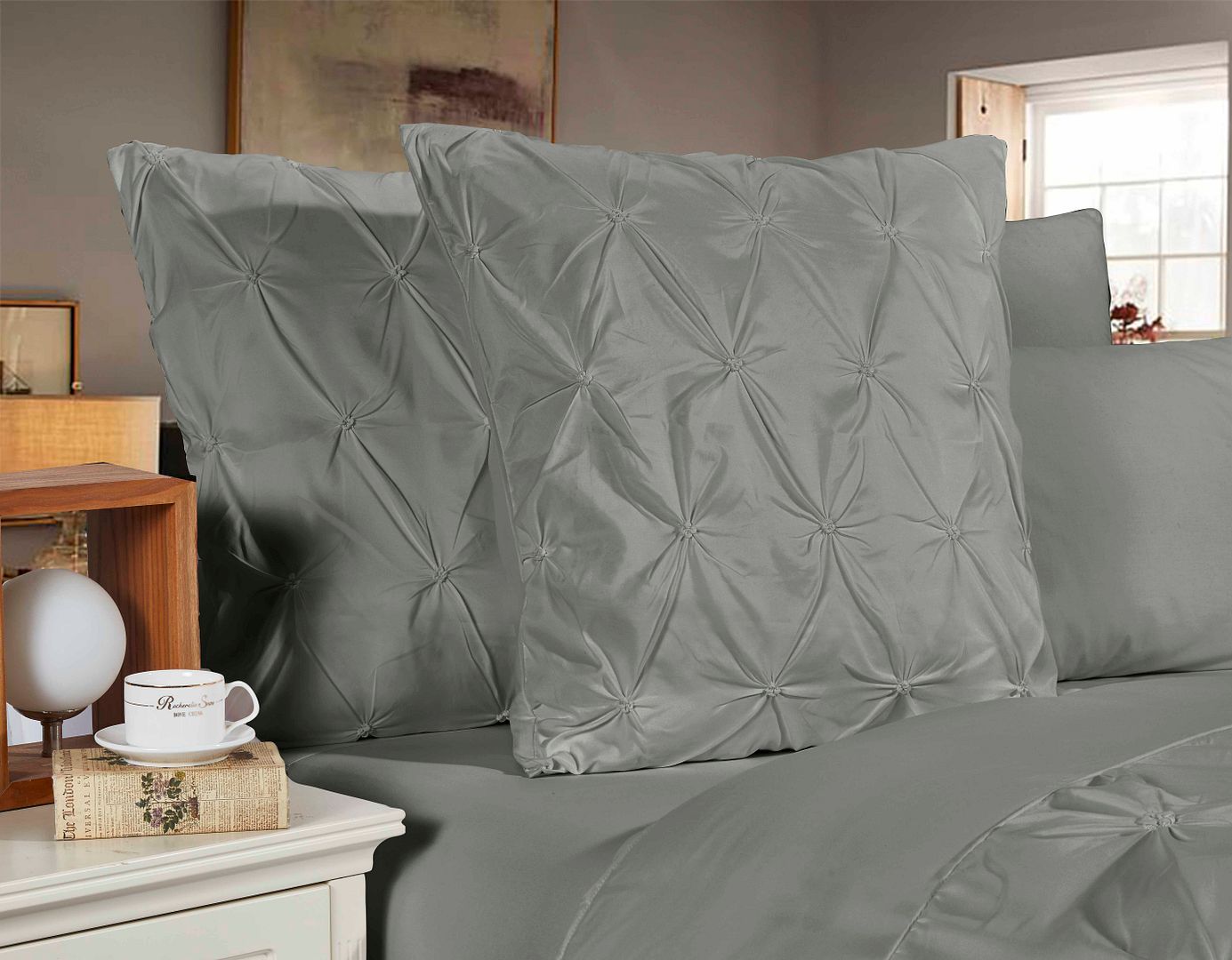 Elegant grey pintuck European pillowcases set on bed, showcasing premium ultra-soft fabric and refined design.