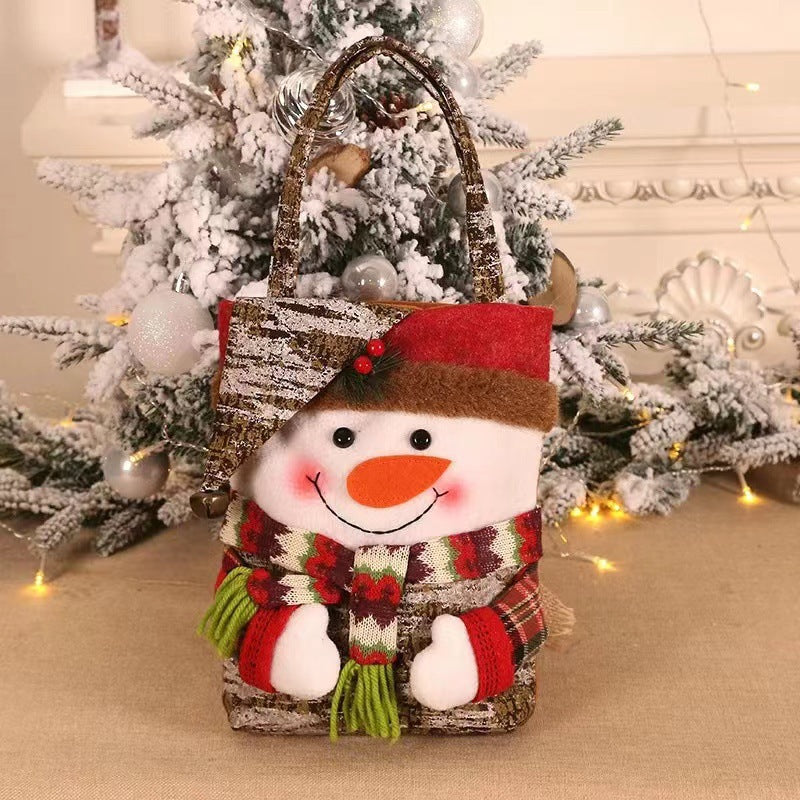 Adorable snowman Christmas gift bag with festive design, perfect for holiday treats and presents.