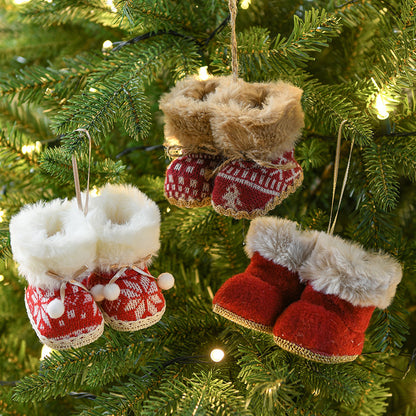 Set of 3 knitted Christmas boot ornaments with faux fur trim hanging on a Christmas tree, perfect for festive decorations.