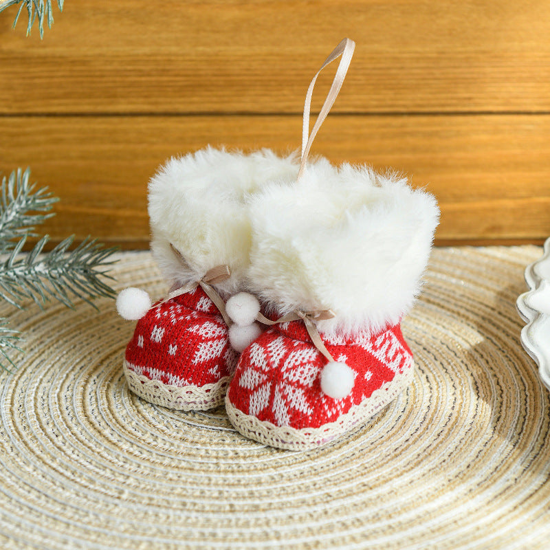 Cozy knitted Christmas boot ornaments with faux fur trim, perfect for festive tree and mantle decorations.