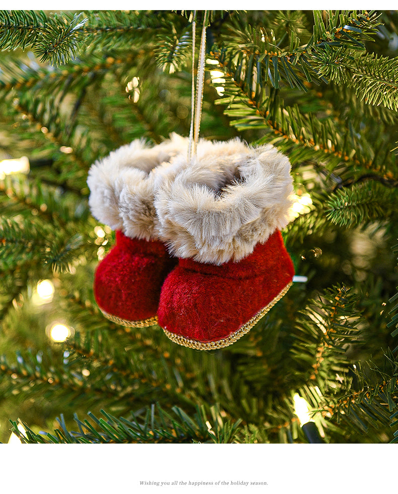 Knitted Christmas boot ornament with faux fur trim hanging on a festive tree, perfect for holiday decorations.