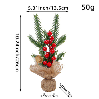 Mini Christmas pine tree with red berries in burlap base, 26 cm tall, perfect for festive table decorations.