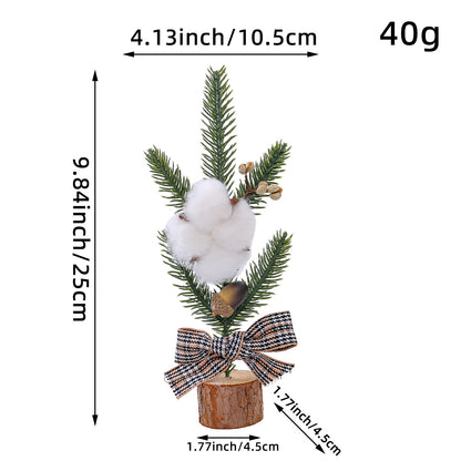 Mini rustic Christmas tree decoration with cotton and plaid bow, perfect for Christmas table decorations.