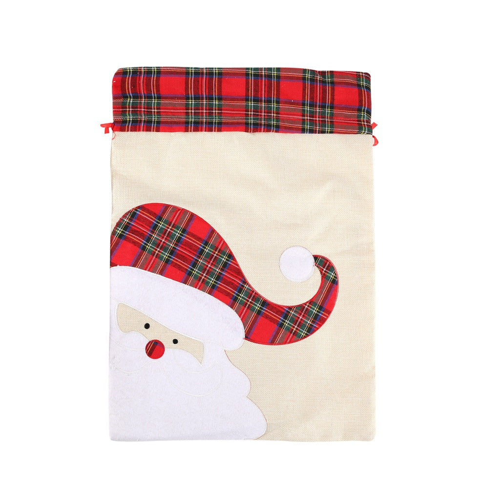 Large Santa Claus gift bag with plaid drawstring, perfect for holiday presents and Christmas gift giving.