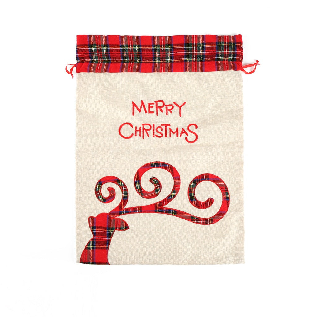 Large Merry Christmas drawstring gift bag with plaid accents for holiday presents, perfect as a festive Santa sack.