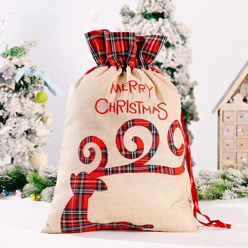 Large Merry Christmas drawstring gift bag with plaid design, perfect for holiday presents and Christmas gifts.