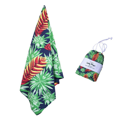 Lazy Dayz sand free beach towel in vibrant tropical design, featuring quick-drying fabric and compact carry pouch.