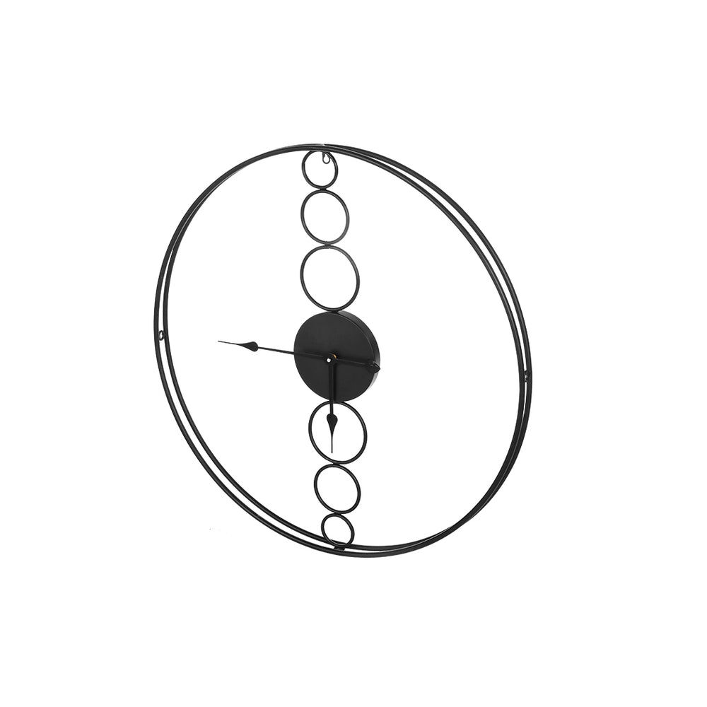 Large black wall clock with a minimalist design and no numerals, perfect for modern interiors.