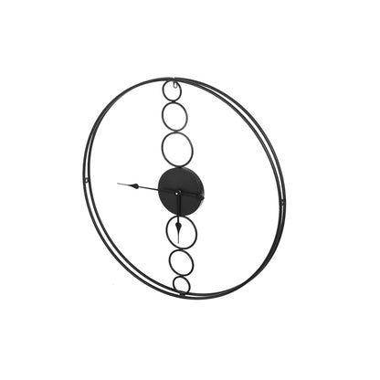 Large black wall clock with a minimalist design and no numerals, perfect for modern interiors.